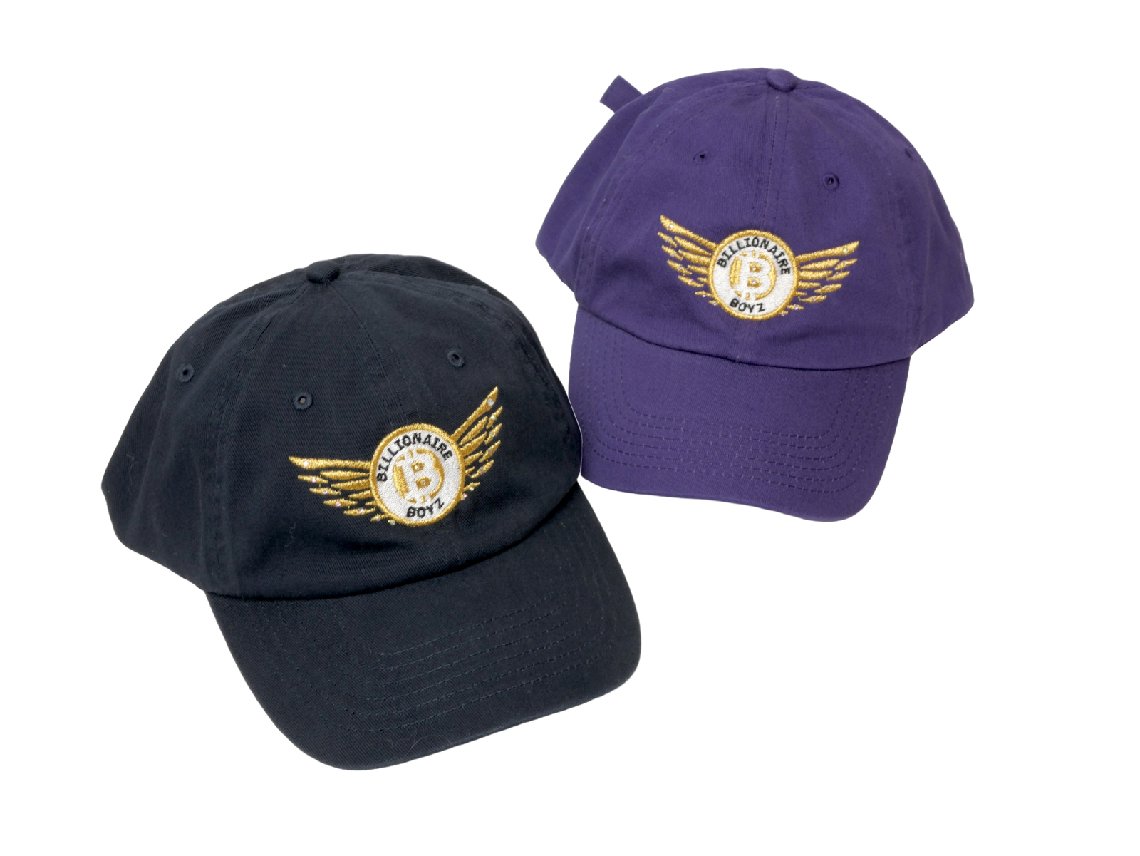 Two each of gray, white, and black shirts laying flat.